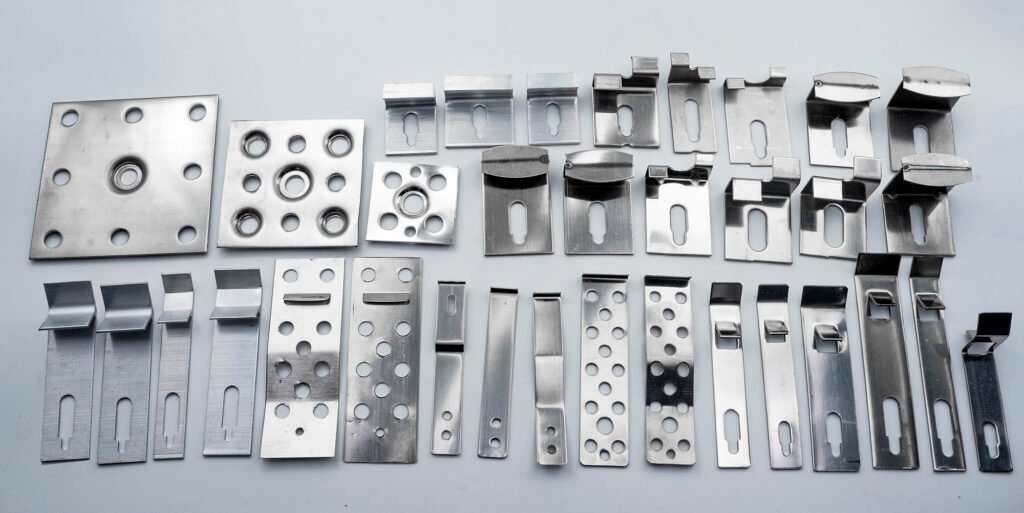 Cladding clip applications for ceramic tile and porcelain facade panels